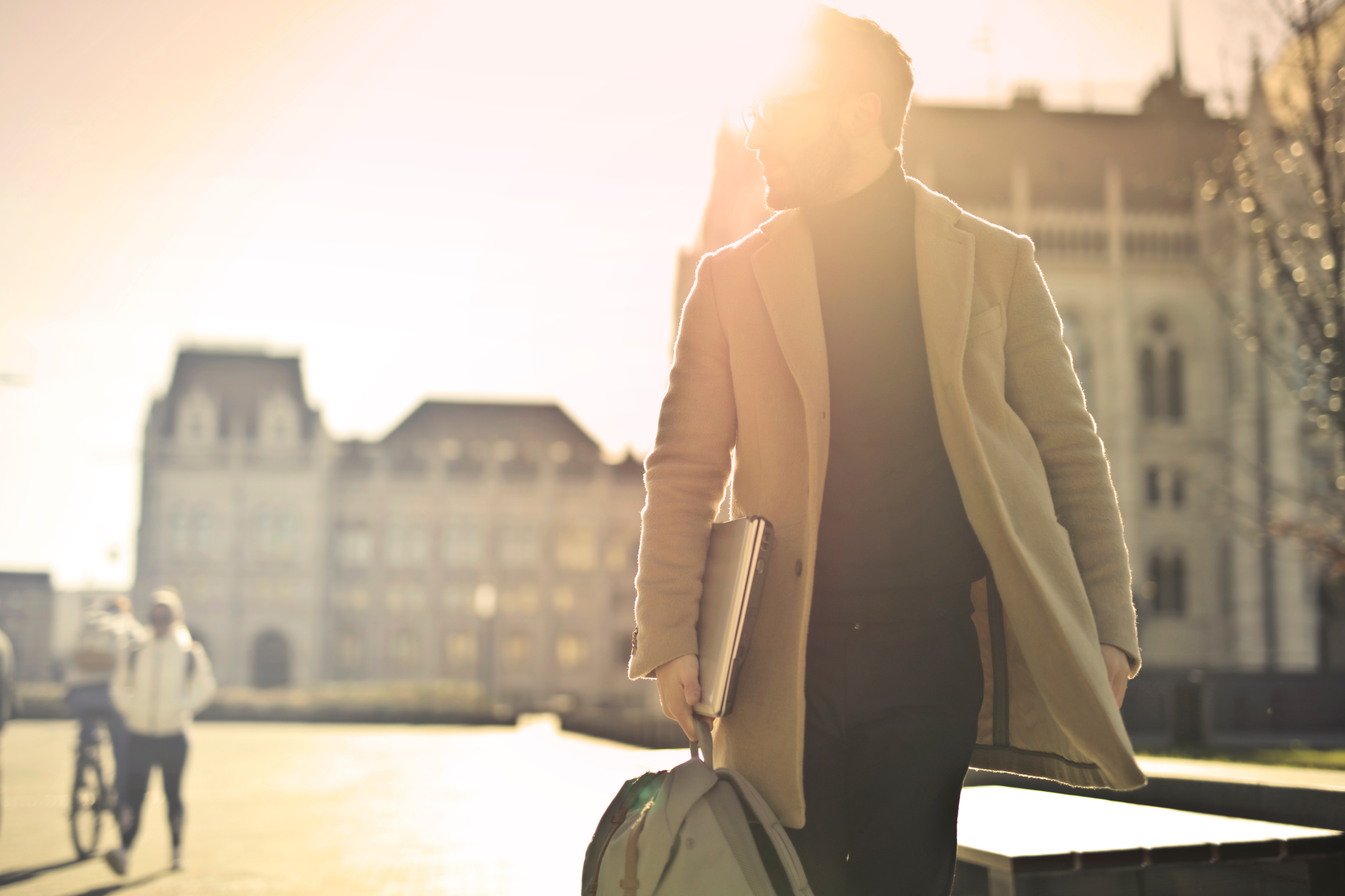 photo-of-man-wearing-brown-coat-842539